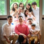 Family generation photoshoot of three generations of parents and children natural light portrait photography