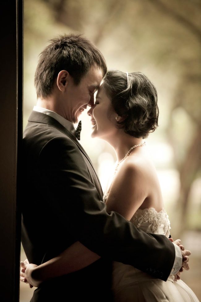 Bridal Photography Singapore bride and groom nose to nose smiling and hugging