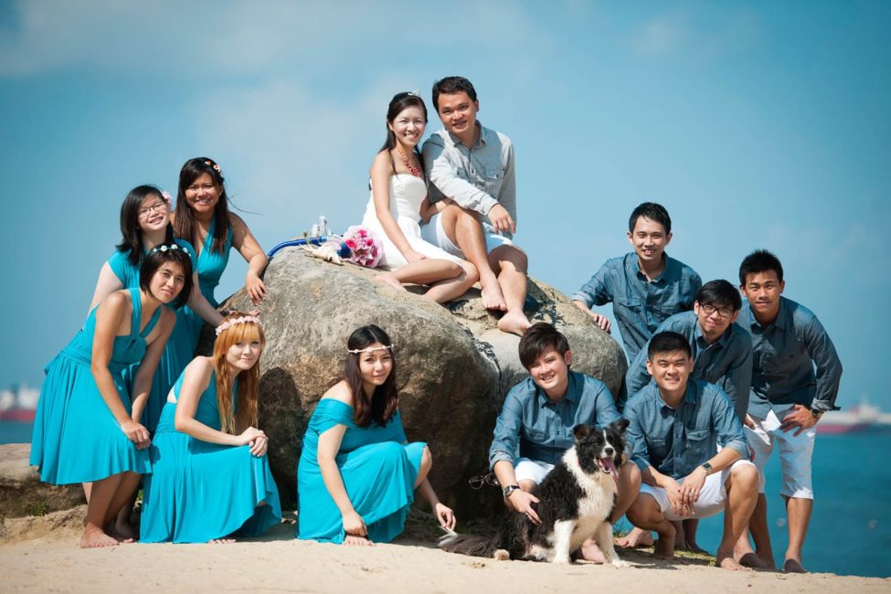Bridal Photography Singapore bride, groom and bridal party in blue group photo outdoor photoshoot