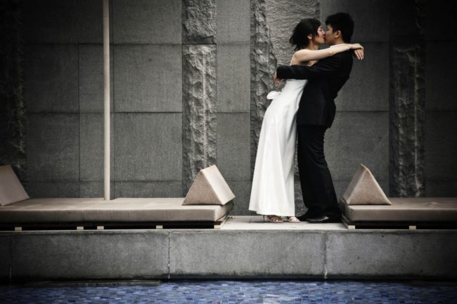 Bridal Photoshoot Singapore bride and groom hugging and kissing outdoor photography
