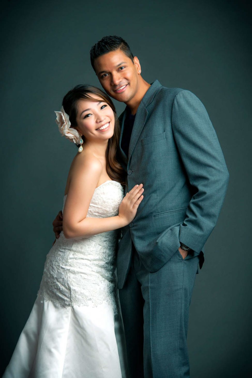 Bridal Photoshoot Singapore bride and groom standing together and smiling portrait