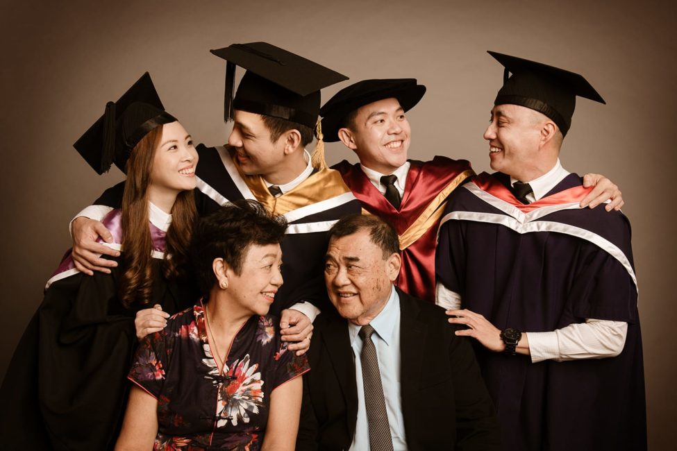 Convocation Photoshoot Package Singapore family candid pictures of 4 university graduates and their grandparents