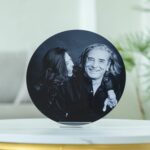 Metal print of husband and wife in a photography studio setting during a couple photoshoot in Singapore, White Room Studio. Credit: White Room Studio Pte Ltd
