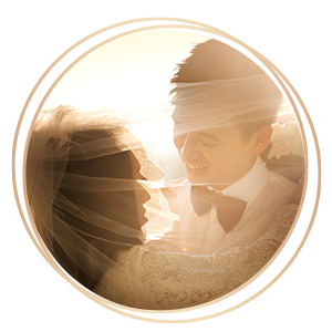 Bridal Photography bride and groom smiling under wedding veil natural light portrait