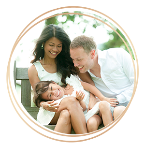 Family Kids Photography happy father mother and child sitting on park bench