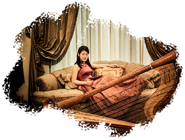 Glamour Photography Singapore woman in modern cheongsam sitting on sofa posing with harp instrument and baroque designed room