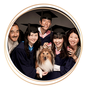 Graduation Photography smiling graduates and family members with pet dog portrait