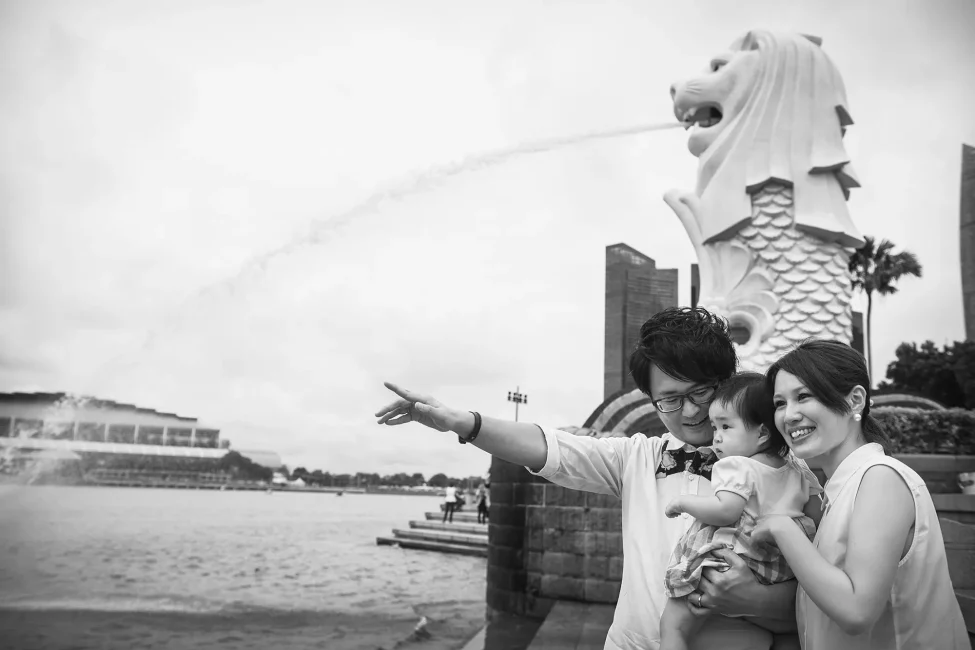 Family photoshoot studio session with family and young toddler in outdoor photoshoot, photographed by White Room Studio, 219 River Valley Road, Singapore. Natural light family portrait 2026