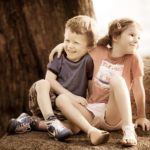 Children outdoor photoshoot Singapore 2 young kids smiling