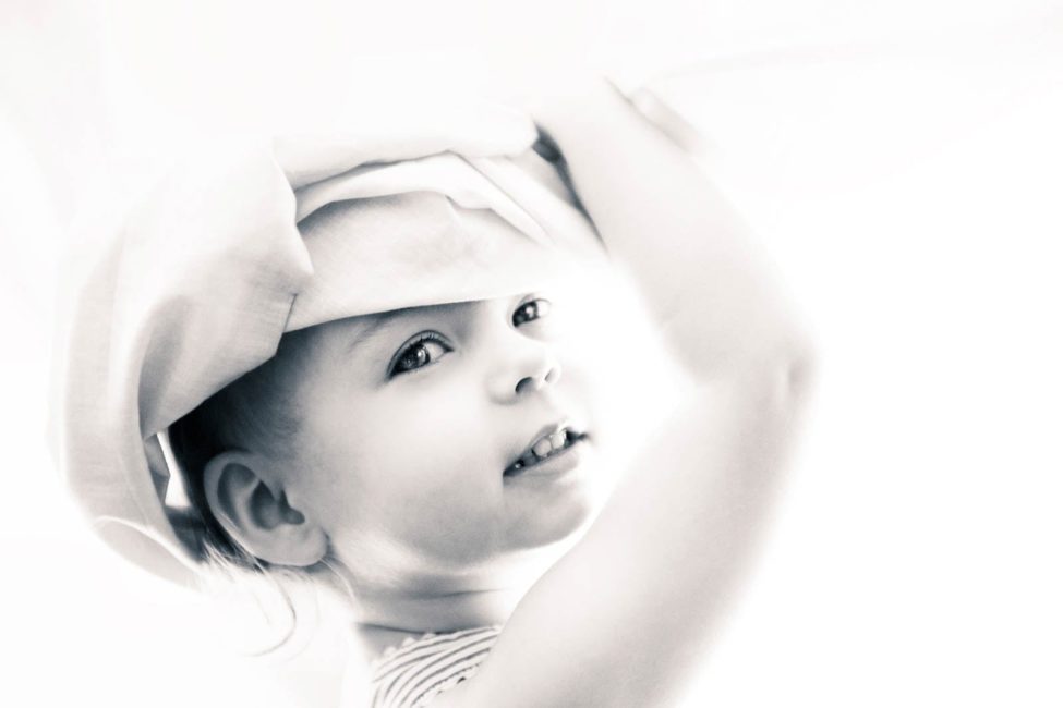 Kids Portrait Singapore young child smiling natural portrait black and white photography