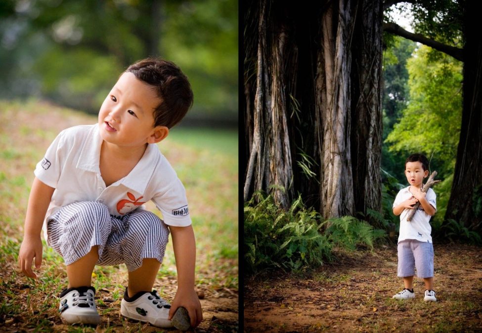 Kids Singapore Photoshoot Outdoor young boy squatting down and standing with branch and rock