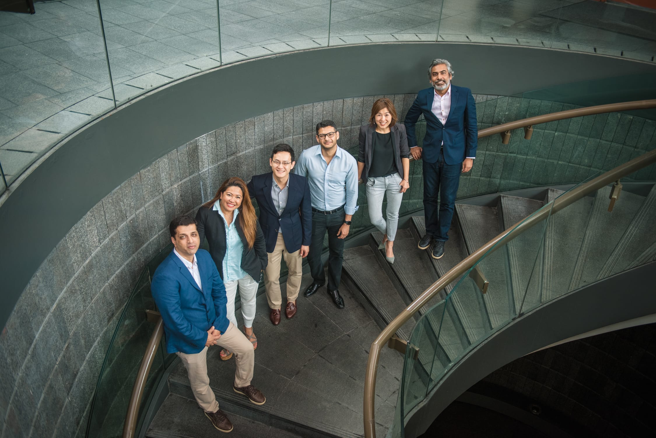 Corporate individuals and business professionals in outdoor setting during an outdoor photoshoot in Singapore. Credit: White Room Studio Pte Ltd