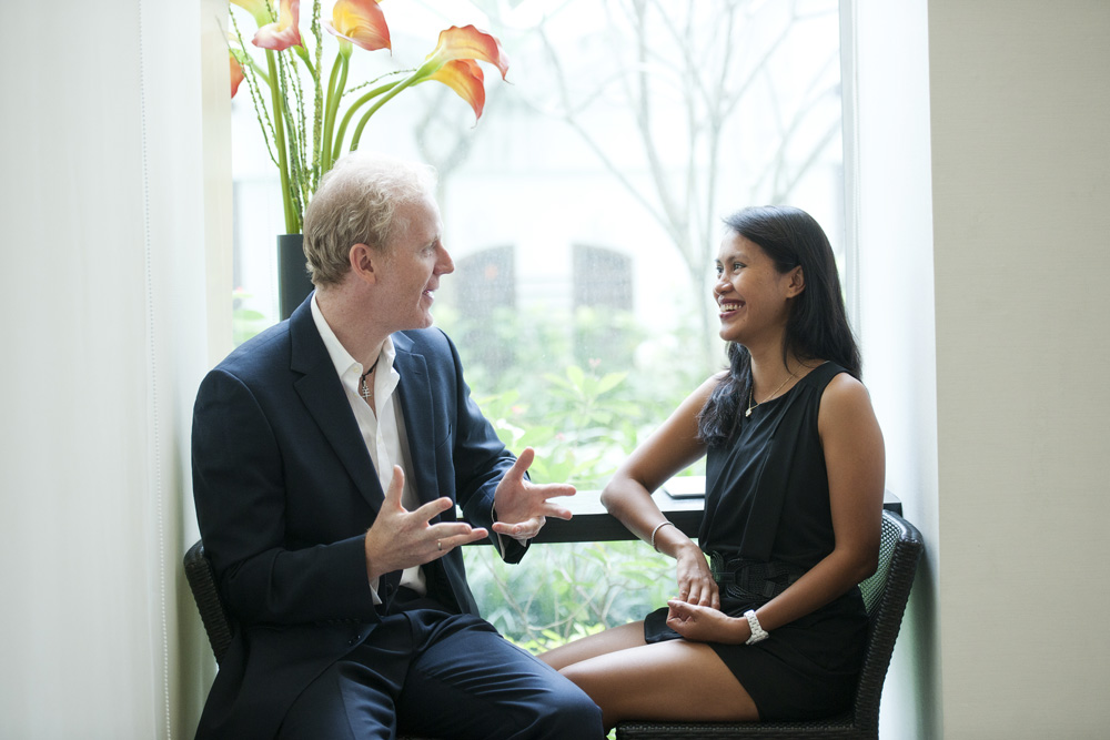 Corporate individuals and business professionals in an office setting during a company and corporate photoshoot in Singapore. Credit: White Room Studio Pte Ltd