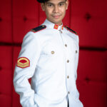 Man wearing military uniform posing for portrait in a photography studio setting during a personal branding photoshoot in Singapore, White Room Studio. Credit: White Room Studio Pte Ltd