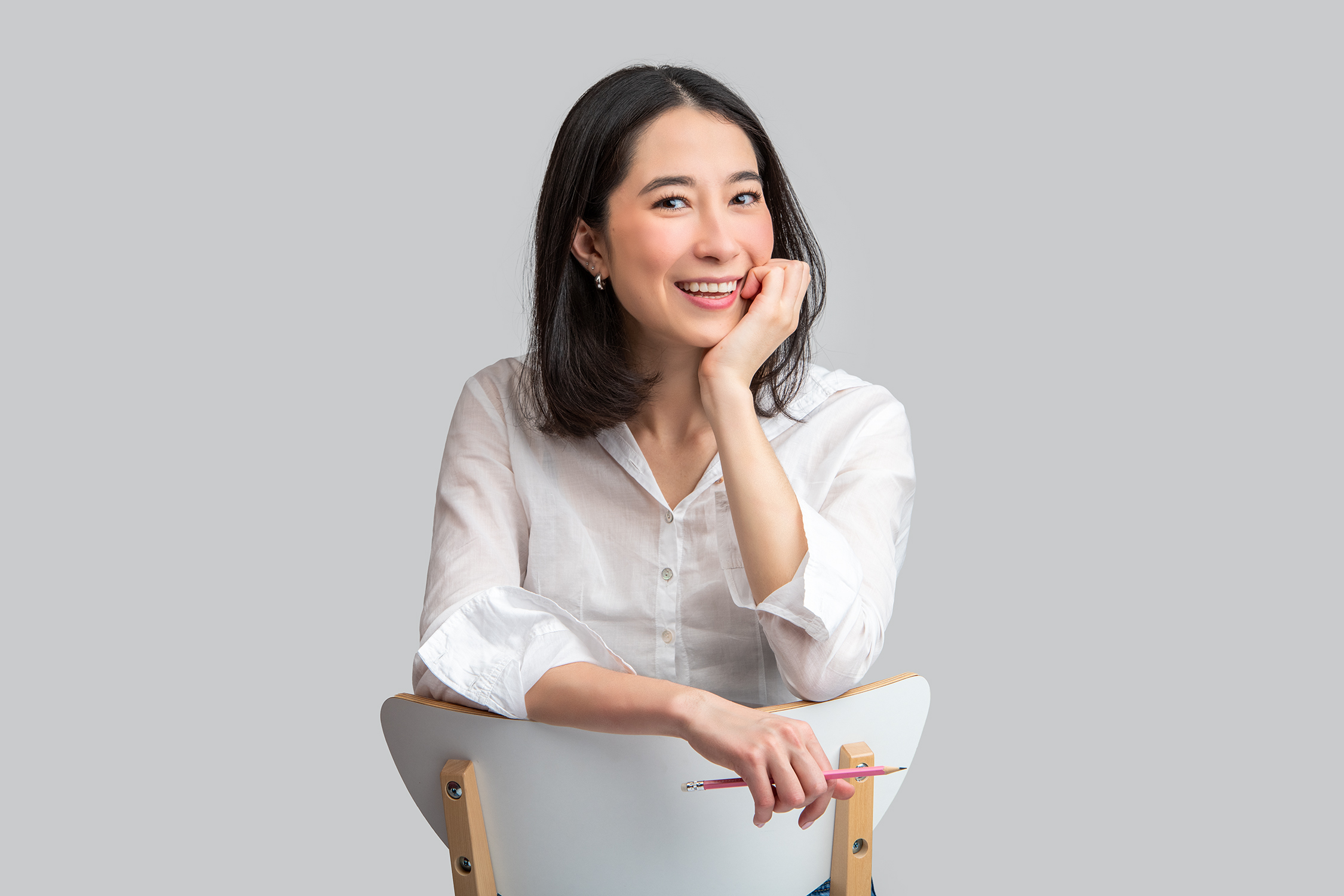 Serious successful female professional posing with clasped hands. Young  African American business woman standing isolated over white background,  looking at camera. Corporate portrait concept Stock Photo | Adobe Stock