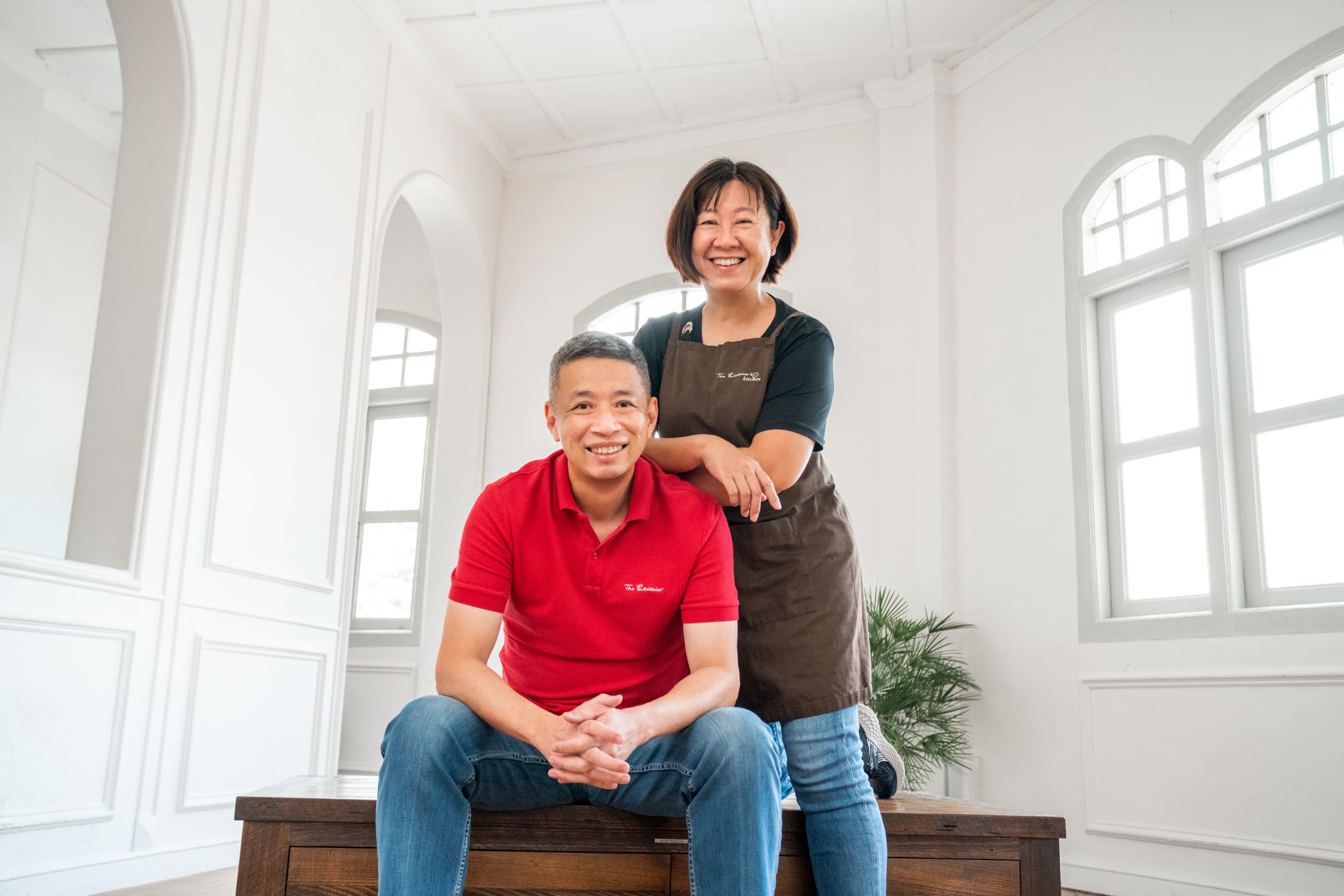 Professional bakers wearing apron in a photography studio setting during a corporate photoshoot in Singapore, White Room Studio. Credit: White Room Studio Pte Ltd