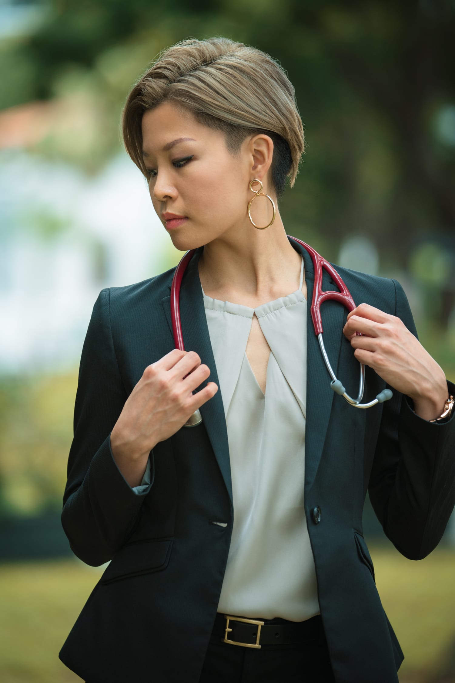 A portrait of a medical doctor with stethoscope posing in his office Stock  Photo - Alamy