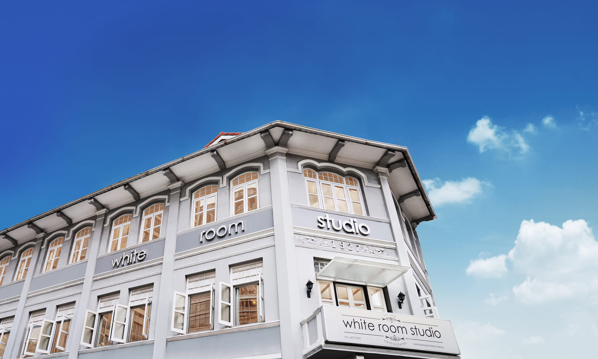 white-room-studio-exterior-blue-sky-with-clouds A two-storey shophouse photography studio in River Valley, Singapore taken against a blue sky Credit: White Room Studio