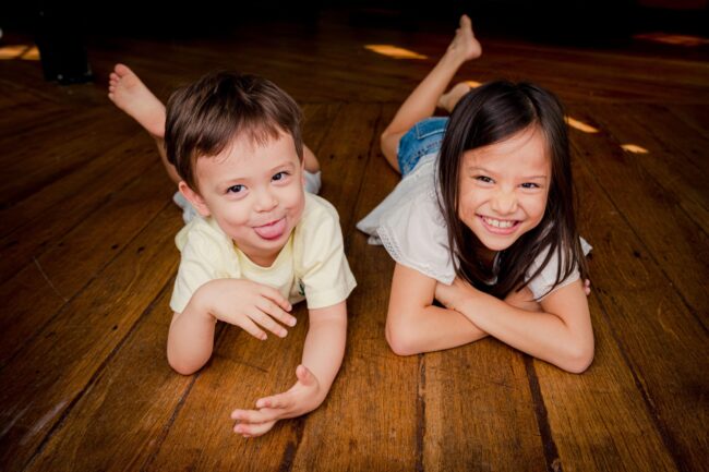 Two kids boy and girl in a photography studio setting during a family and kids photoshoot in Singapore, White Room Studio. Credit: White Room Studio Pte Ltd