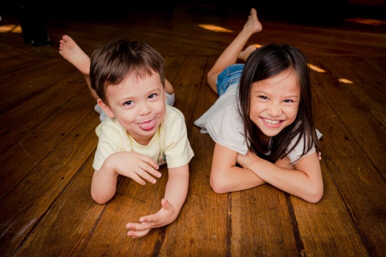 Two kids boy and girl in a photography studio setting during a family and kids photoshoot in Singapore, White Room Studio. Credit: White Room Studio Pte Ltd