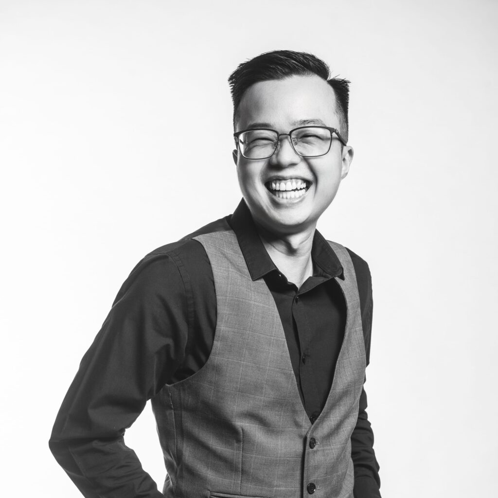 Professional Corporate & Company Photoshoot in Photography Studio, Singapore Profesisonal headshot of a professional photographer in a photography studio setting during a corporate photoshoot in Singapore, White Room Studio. Credit: White Room Studio Pte Ltd
