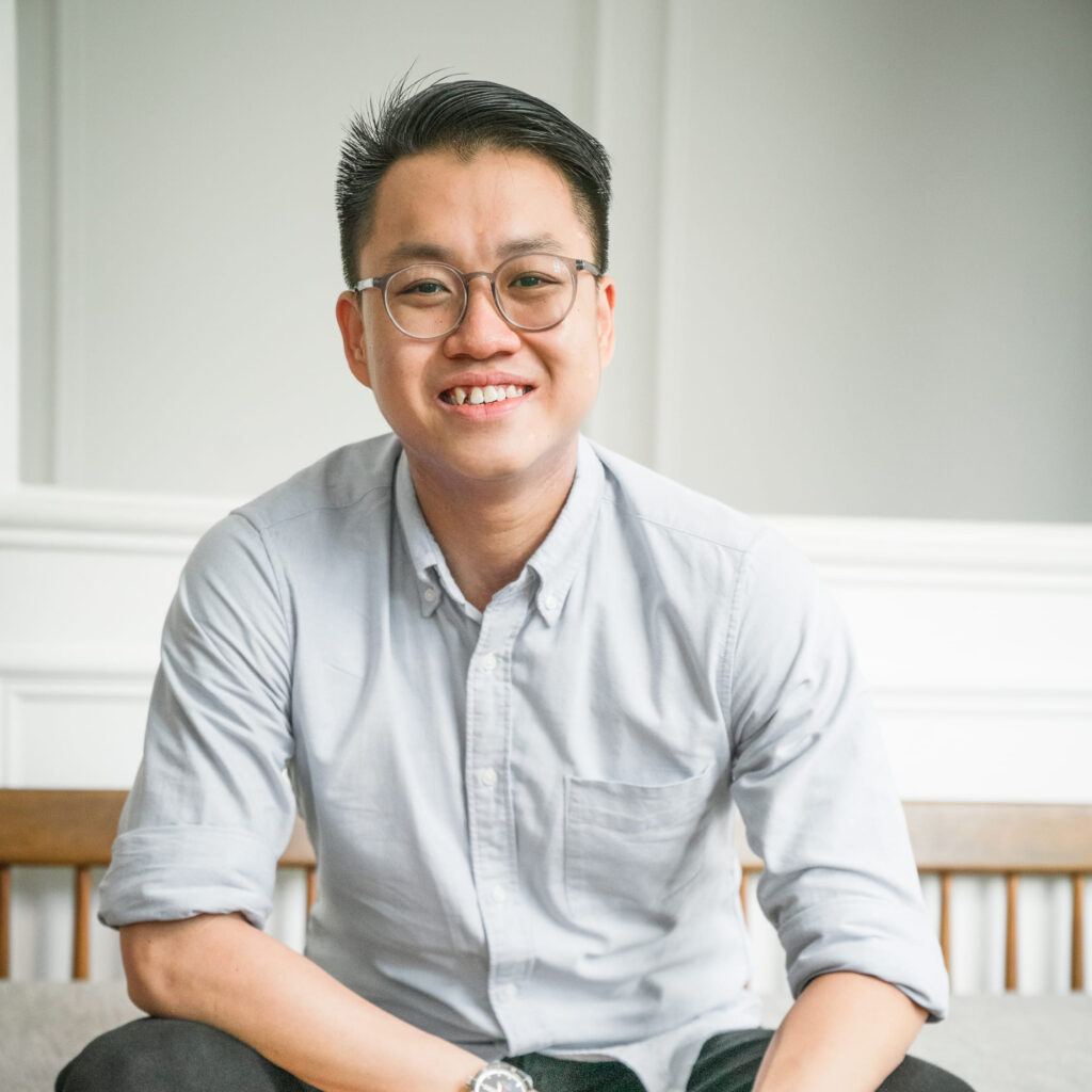 Professional Family Photographer in White Room Studio, Singapore Portrait of a professional photographer in a photography studio setting during a personal portrait photoshoot in Singapore, White Room Studio. Credit: White Room Studio Pte Ltd