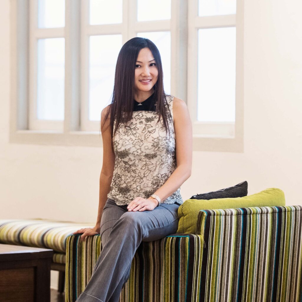 Portrait of a woman in a photography studio setting during a personal portrait photoshoot in Singapore, White Room Studio. Credit: White Room Studio Pte Ltd