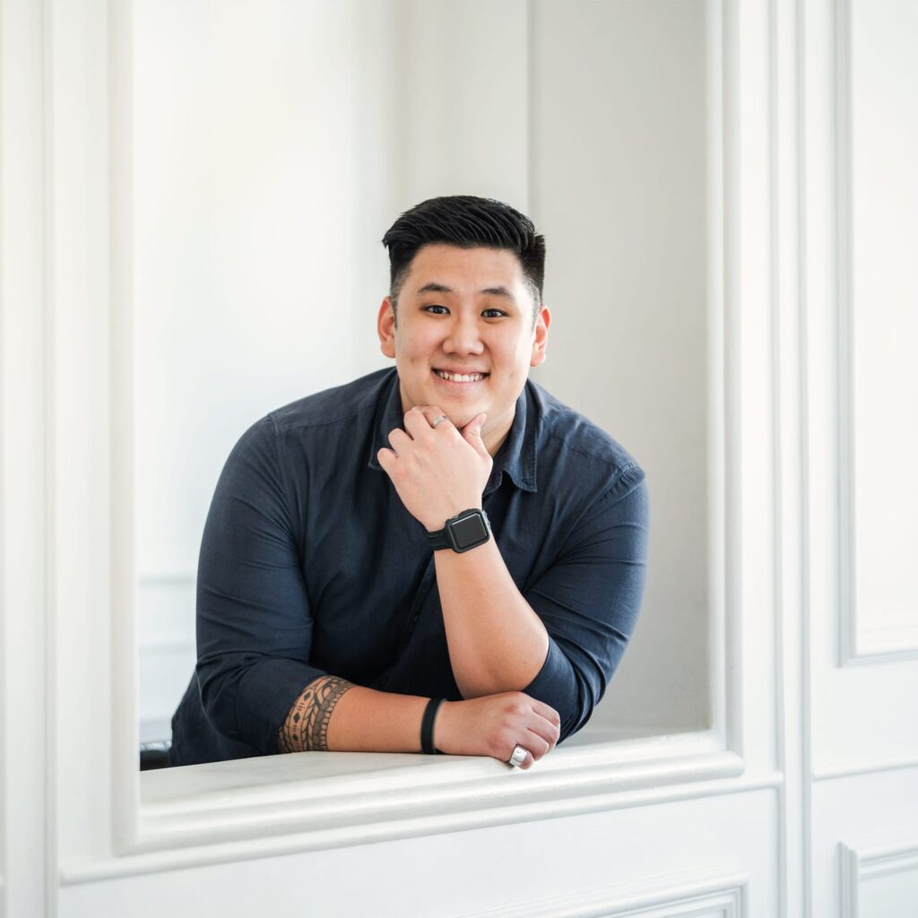 Portrait of a professional photographer in a photography studio setting during a personal portrait photoshoot in Singapore, White Room Studio. Credit: White Room Studio Pte Ltd