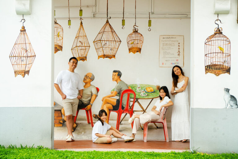 Family with parents and their children in an outdoor setting during an outdoor family photoshoot in Singapore, Tiong Bahru. Credit: White Room Studio Pte Ltd