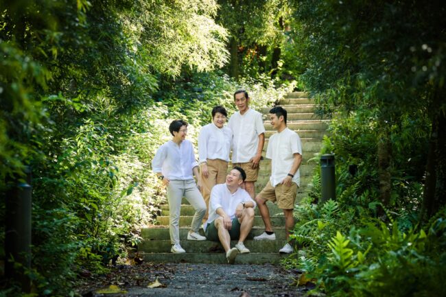 Professional Family & Multi Generation Photoshoot in Gardens by the Bay, Singapore Family with parents and their children in an outdoor setting during an outdoor family photoshoot in Singapore, Gardens by the Bay. Credit: White Room Studio Pte Ltd