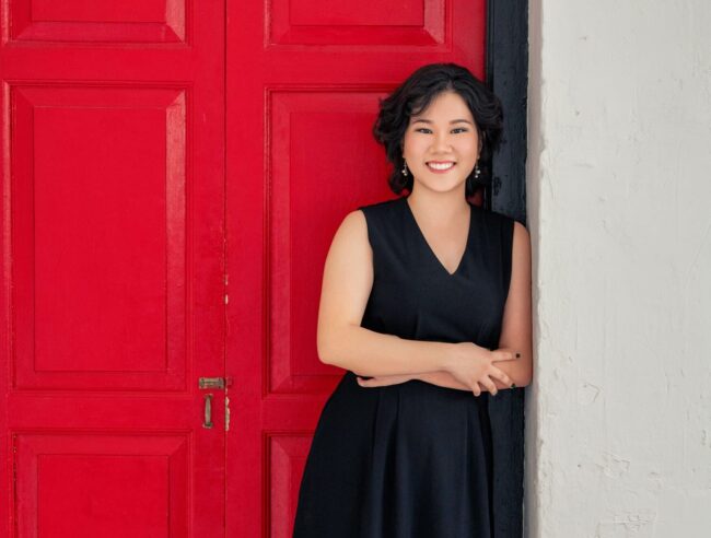 Professional Corporate & Company Photoshoot in Photography Studio, Singapore Corporate professional in a photography studio setting during a corporate photoshoot in Singapore, White Room Studio. Credit: White Room Studio Pte Ltd