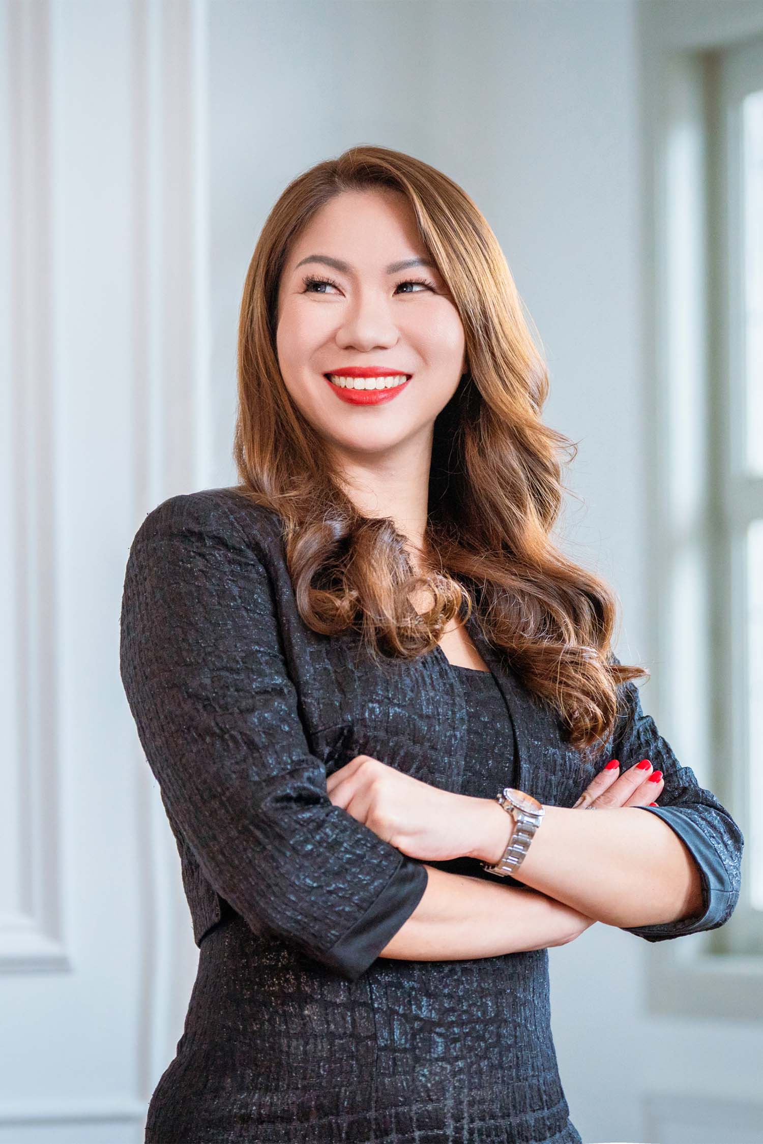 Corporate professional in a photography studio setting during a corporate photoshoot in Singapore, White Room Studio. Credit: White Room Studio Pte Ltd