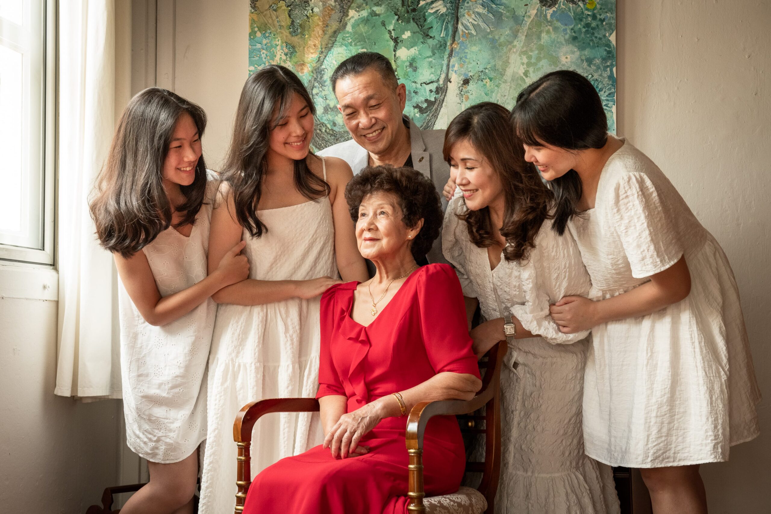 Professional Family & Multi Generation Photoshoot in Photography Studio, Singapore Mother and children in a photography studio setting during a Mother's Day photoshoot in Singapore, White Room Studio. Credit: White Room Studio Pte Ltd