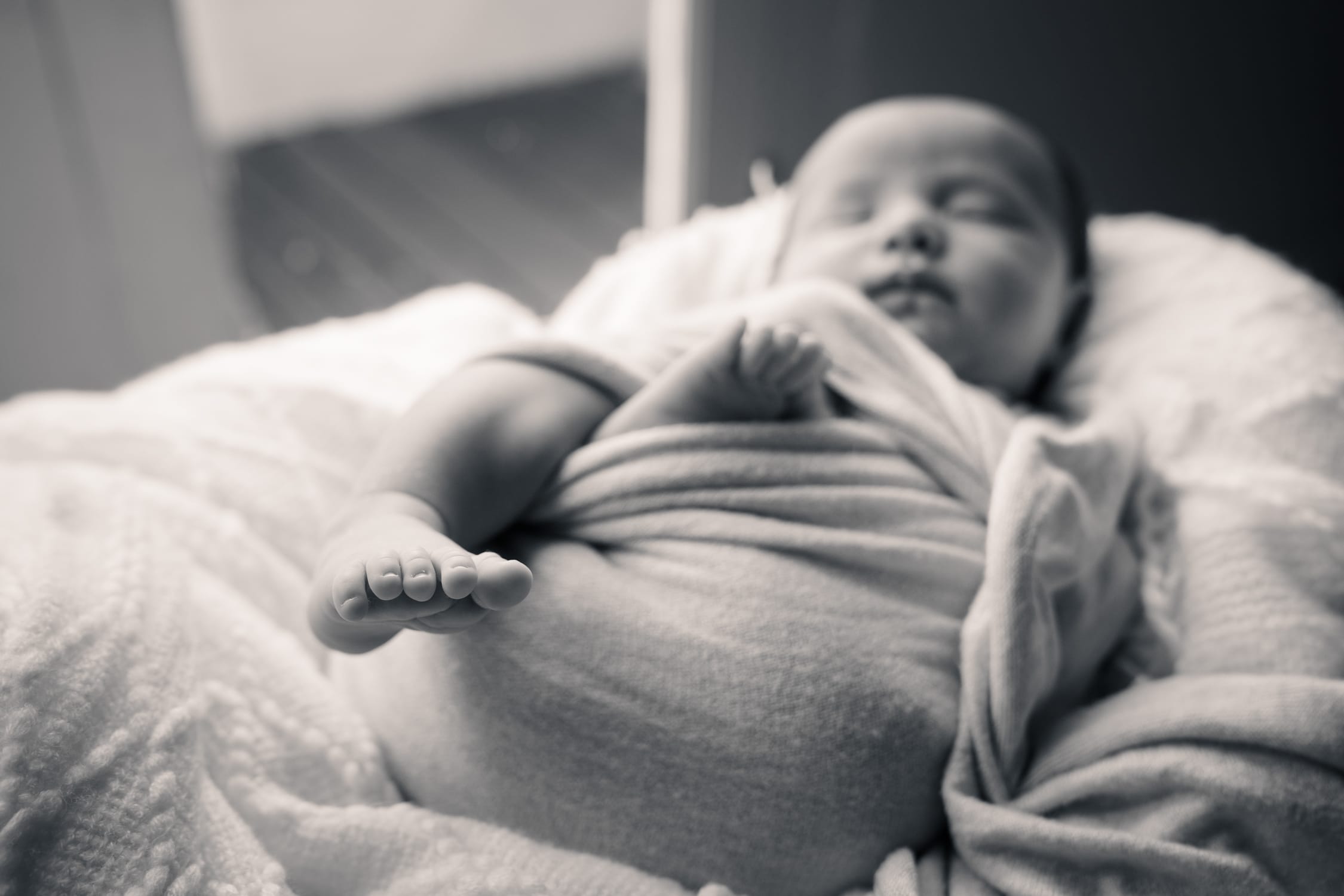 Close up portrait of newborn baby in a photography studio setting during a newborn photoshoot in Singapore, White Room Studio. Credit: White Room Studio Pte Ltd