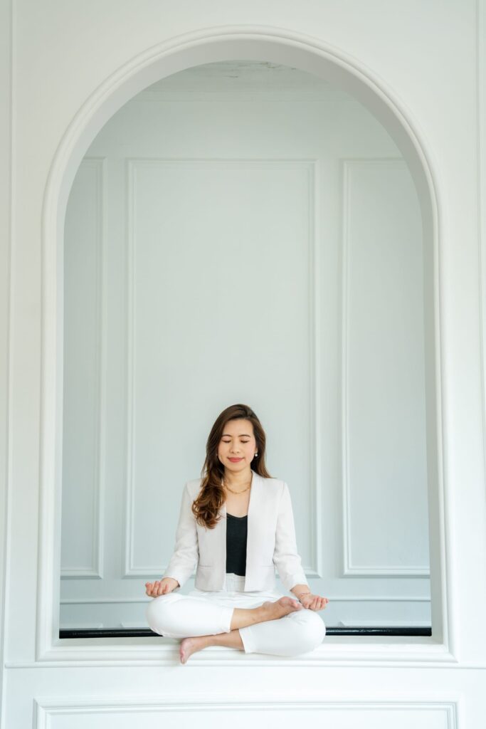 Corporate professional in a photography studio setting during a corporate photoshoot in Singapore, White Room Studio. Credit: White Room Studio Pte Ltd