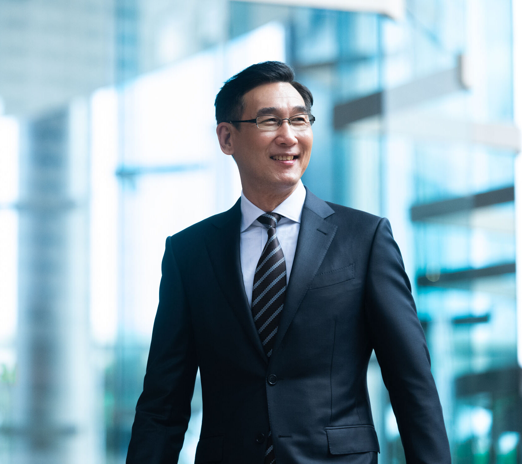 Professional Corporate & Company Photoshoot in Photography Studio, Singapore Man posing for outdoor corporate headshot during a corporate photoshoot in Singapore, White Room Studio. Credit: White Room Studio Pte Ltd