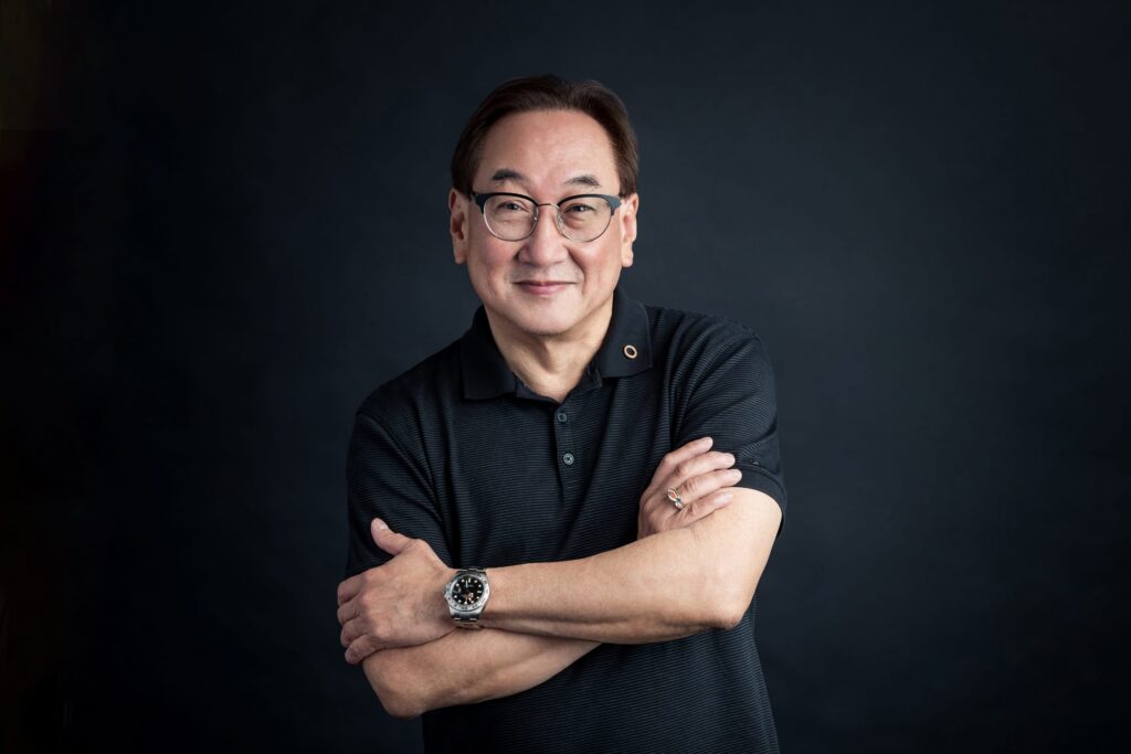 Professional Corporate & Company Photoshoot in Photography Studio, Singapore Oceanographer Michael Aw in a photography studio setting during a corporate photoshoot in Singapore, White Room Studio. Credit: White Room Studio Pte Ltd