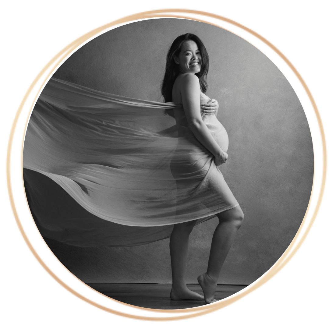 Professional Maternity Photoshoot in Photography Studio, Singapore Pregnant mother, mother-to-be with baby bump in a photography studio setting during a maternity photoshoot in Singapore, White Room Studio. Credit: White Room Studio Pte Ltd