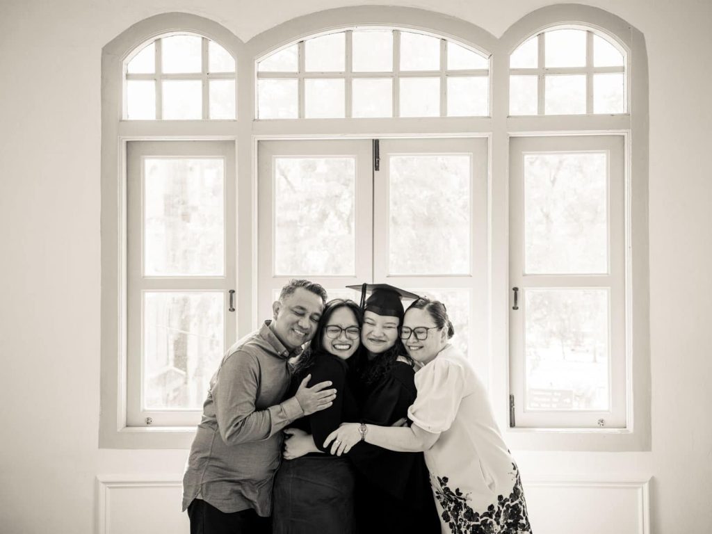 Family graduation portrait at White Room Studio Singapore