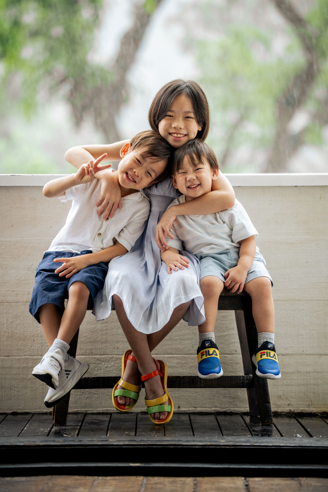 Kids and children laughing at a family photoshoot at White Room Studio