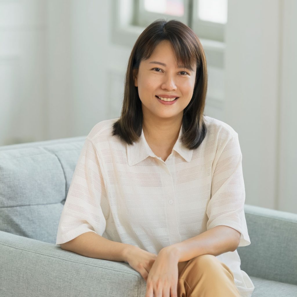 Portrait of a professional imaging artist in a photography studio setting during a personal portrait photoshoot in Singapore, White Room Studio. Credit: White Room Studio Pte Ltd