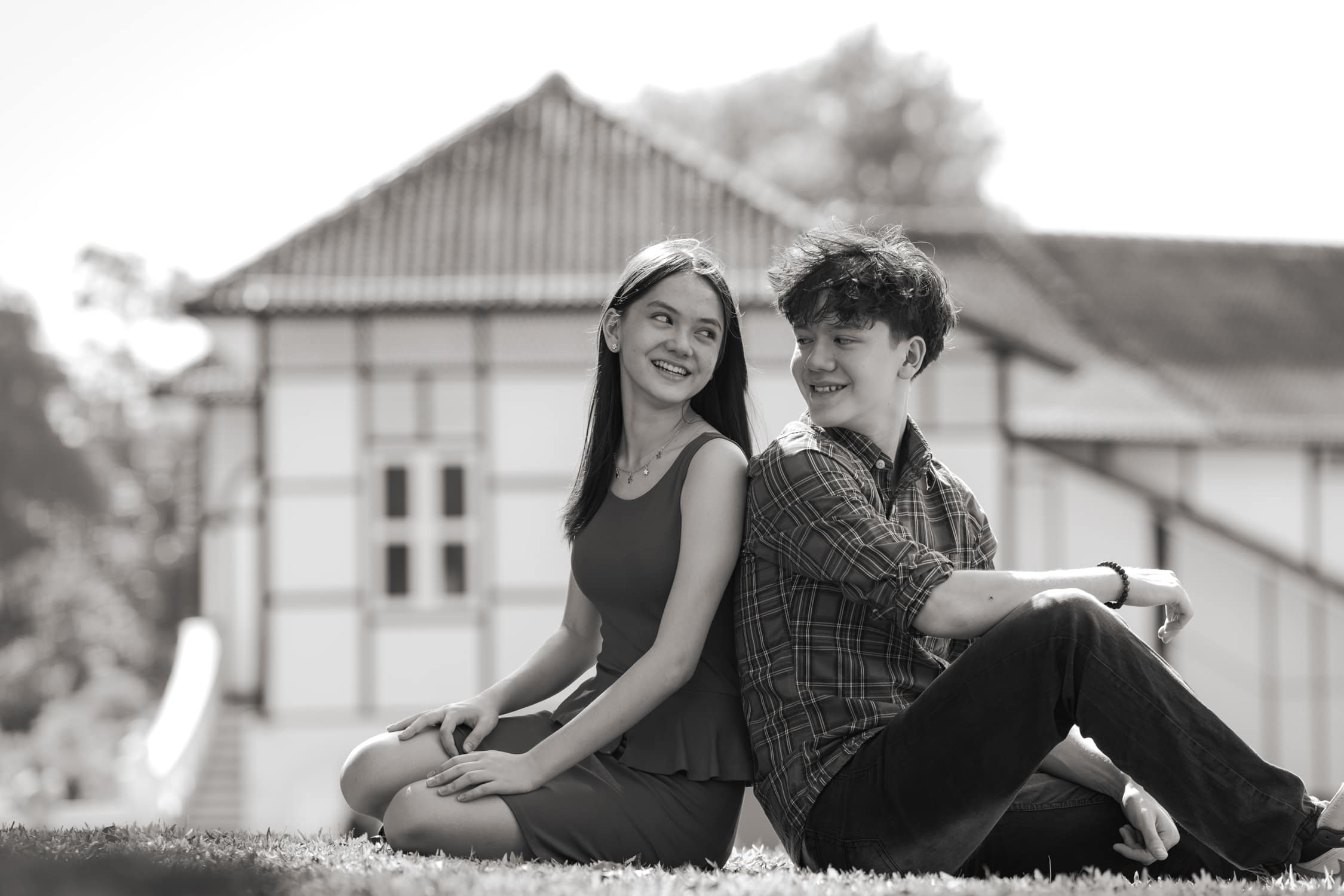 Best Singapore family photo studio, Family with parents and their children with kids ages ranging from toddler to teens in a photography studio setting during a family photoshoot in Singapore, White Room Studio. Credit: White Room Studio Pte Ltd