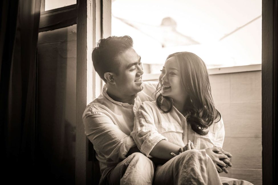 Couple photoshoot in natural light photo studio at White Room Studio, 219 River Valley Road Singapore