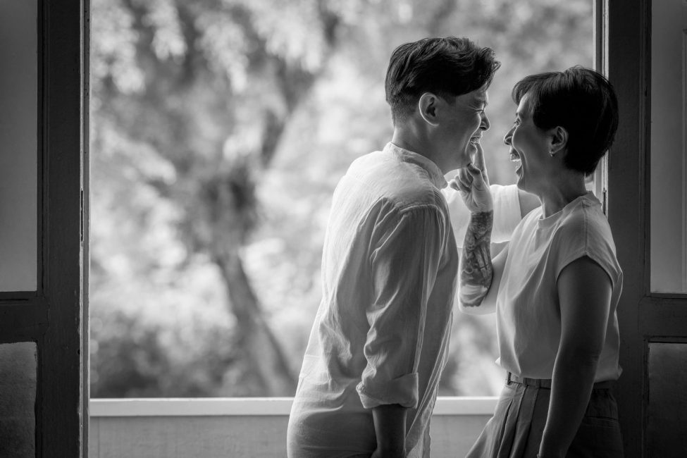 Couple photoshoot in natural light photo studio at White Room Studio, 219 River Valley Road Singapore