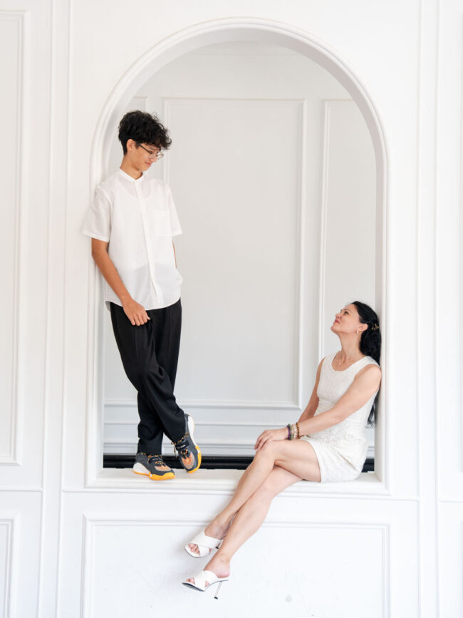 Family in a photography studio setting during a family photoshoot in Singapore, White Room Studio. Credit: White Room Studio Pte Ltd