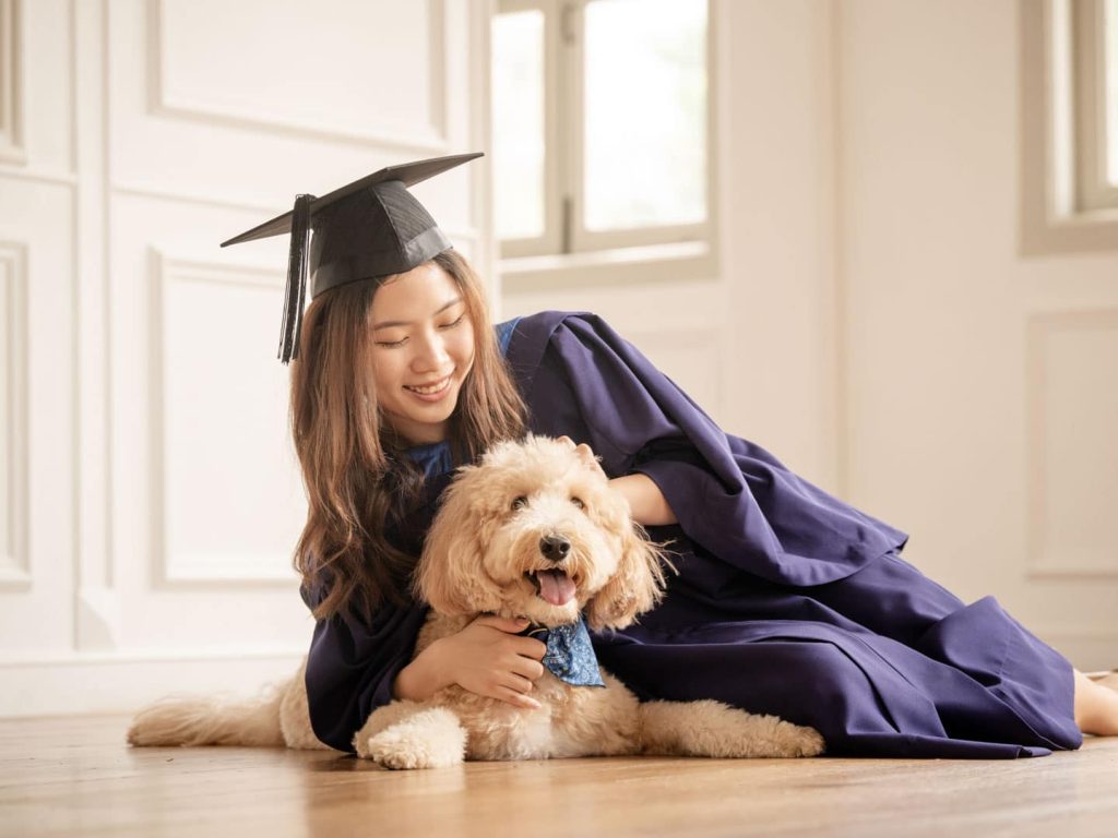 adults in a photography studio setting during a graduation photoshoot in Singapore, White Room Studio. Credit: White Room Studio Pte Ltd