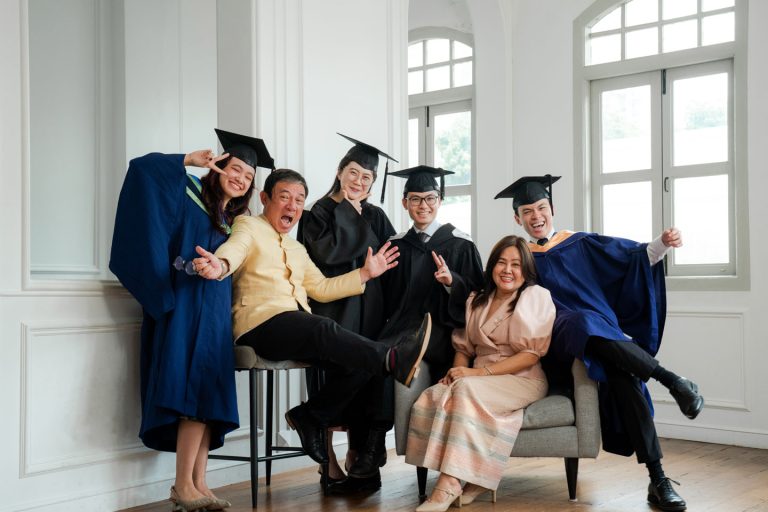Family during a graduation photoshoot at White Room Studio