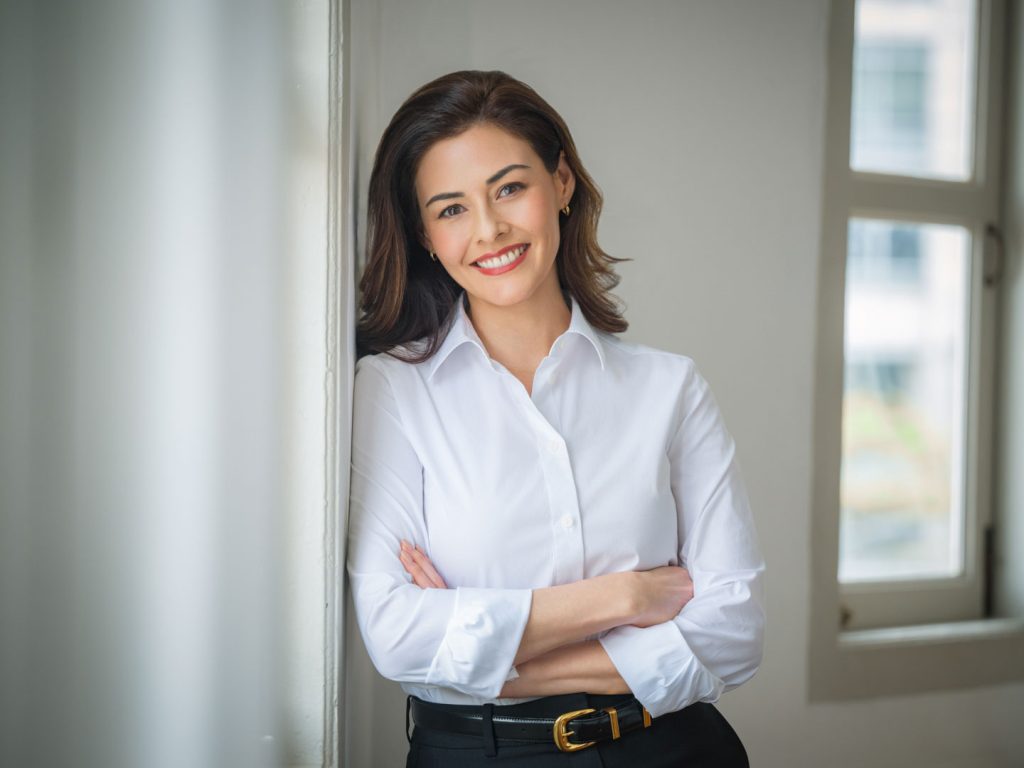 Professional corporate headshot photographed in natural light at White Room Studio, 219 River Valley Road Singapore