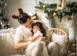 Family photoshoot of a little girl in natural light Christmas photo studio setup at White Room Studio, 219 River Valley Road Singapore