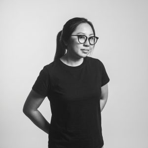 Portrait of a professional photographer in a photography studio setting during a personal portrait photoshoot in Singapore, White Room Studio. Credit: White Room Studio Pte Ltd